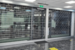 stackdoor transparent shutters commercial shop windows